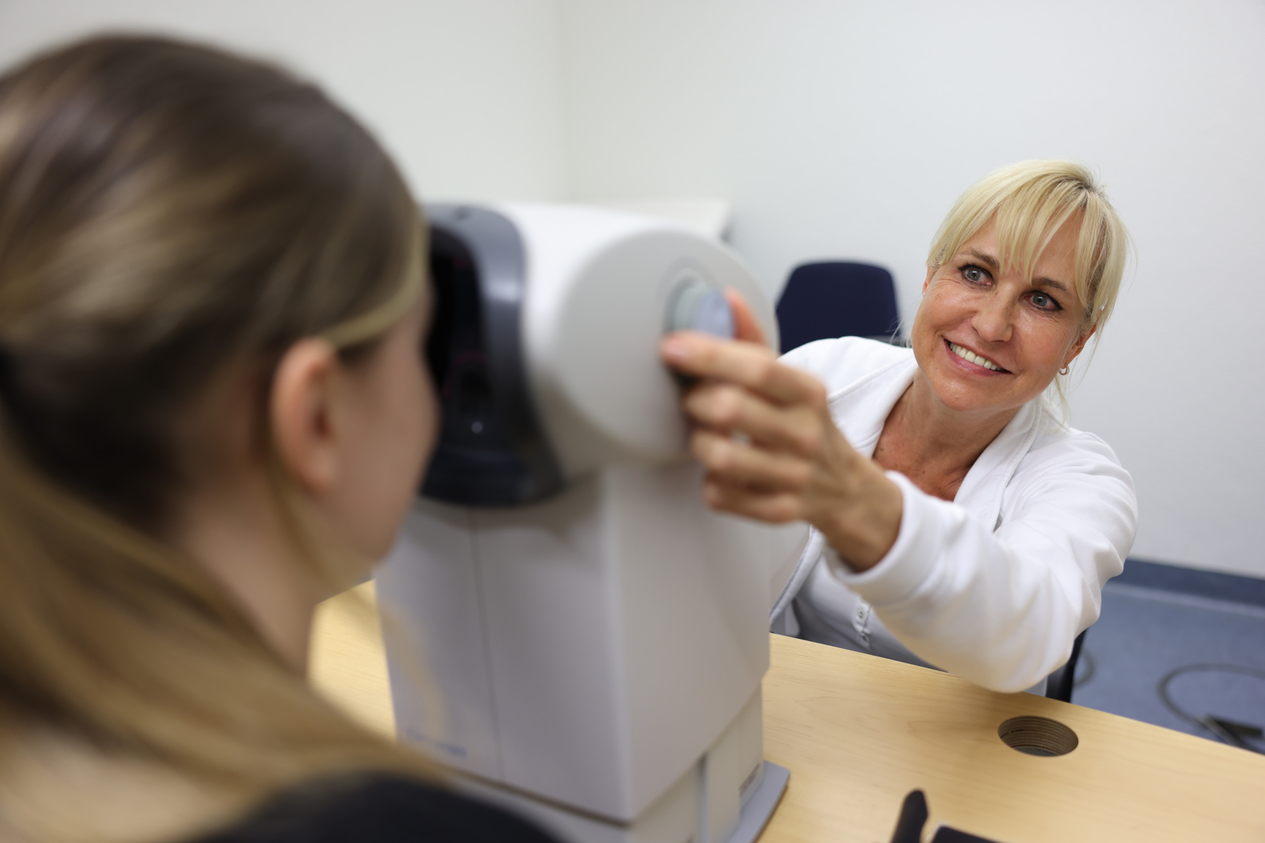 Two women during an eye test