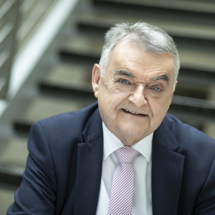 Interior Minister Herbert Reul in front of the stairs