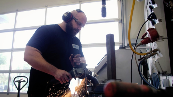 Benedikt Braeuker working in the workshop.